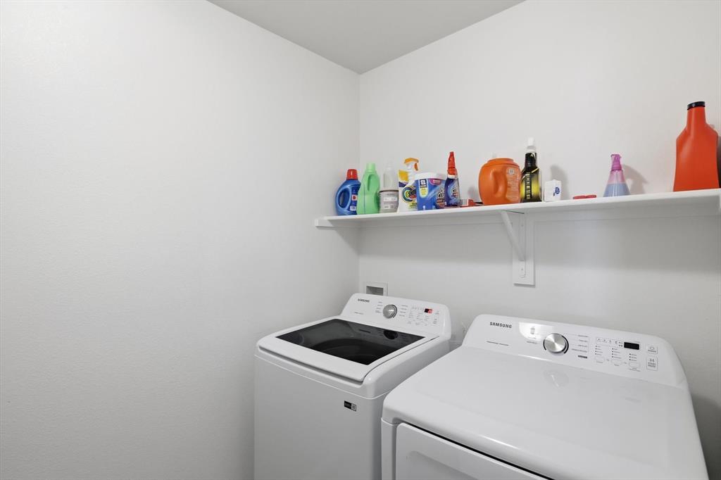 16041 Pious Drive Haslet, TX 76052 - Photo 14 of 36 a utility room with dryer and washer