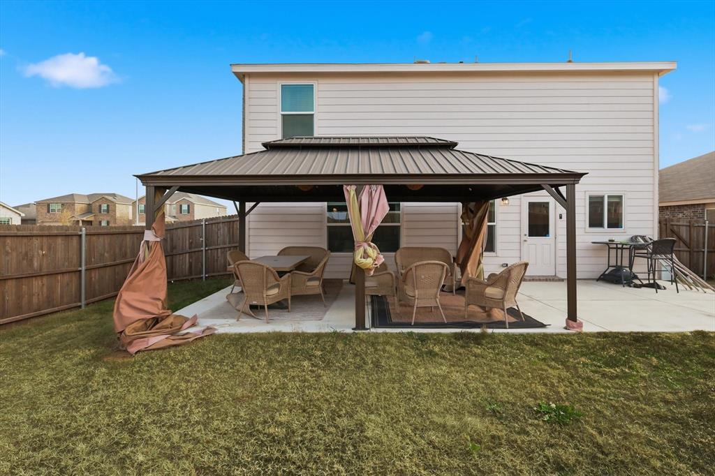16041 Pious Drive Haslet, TX 76052 - Photo 26 of 36 a view of a house with backyard