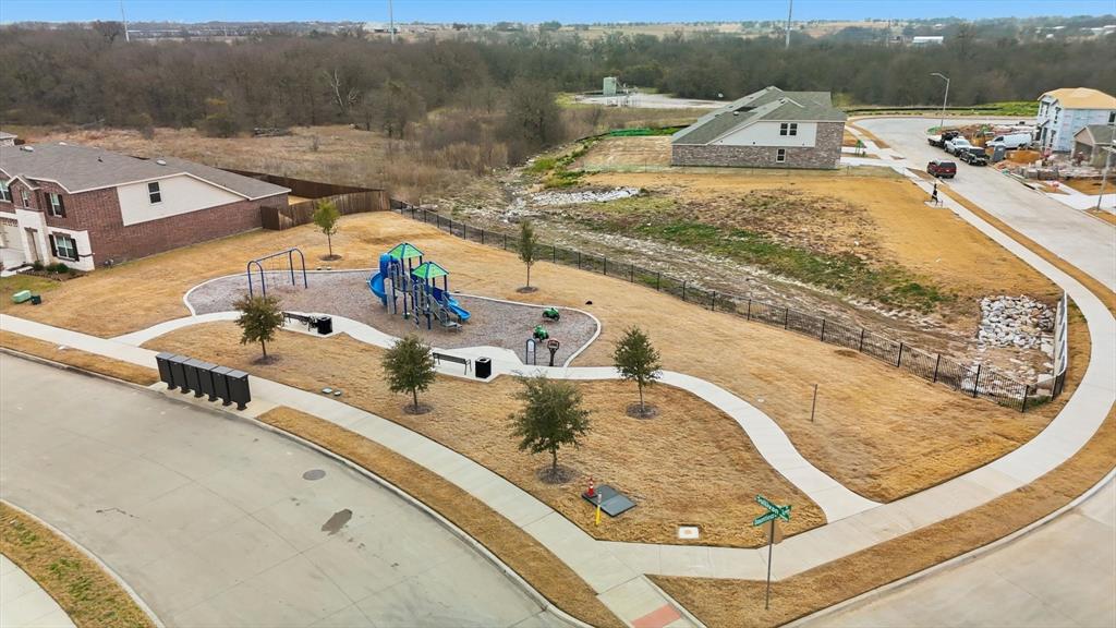 16041 Pious Drive Haslet, TX 76052 - Photo 33 of 36 a view of a swimming pool with a terrace