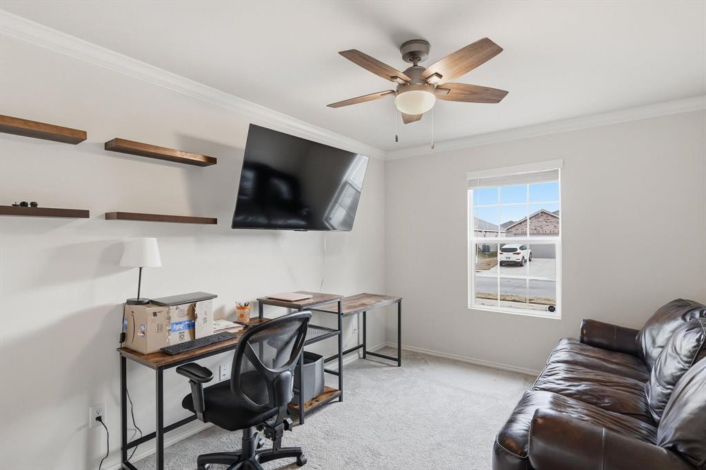 16041 Pious Drive Haslet, TX 76052 - Photo 5 of 36 a view of a livingroom with furniture and a flat screen tv