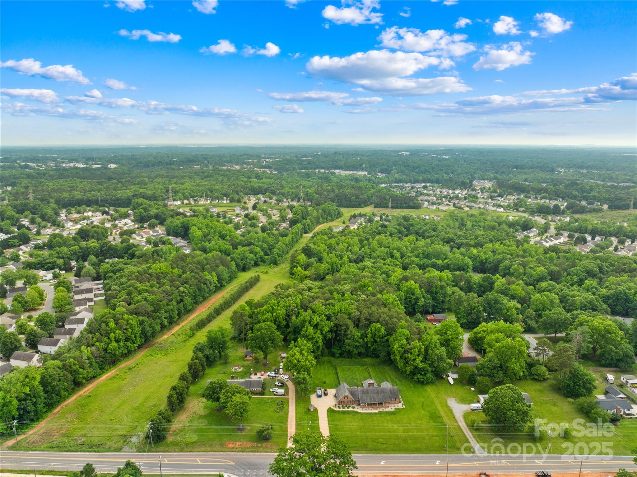 6411 Pleasant Grove Road Charlotte, NC 28216 - Photo 11 of 18 a view of a garden from a yard