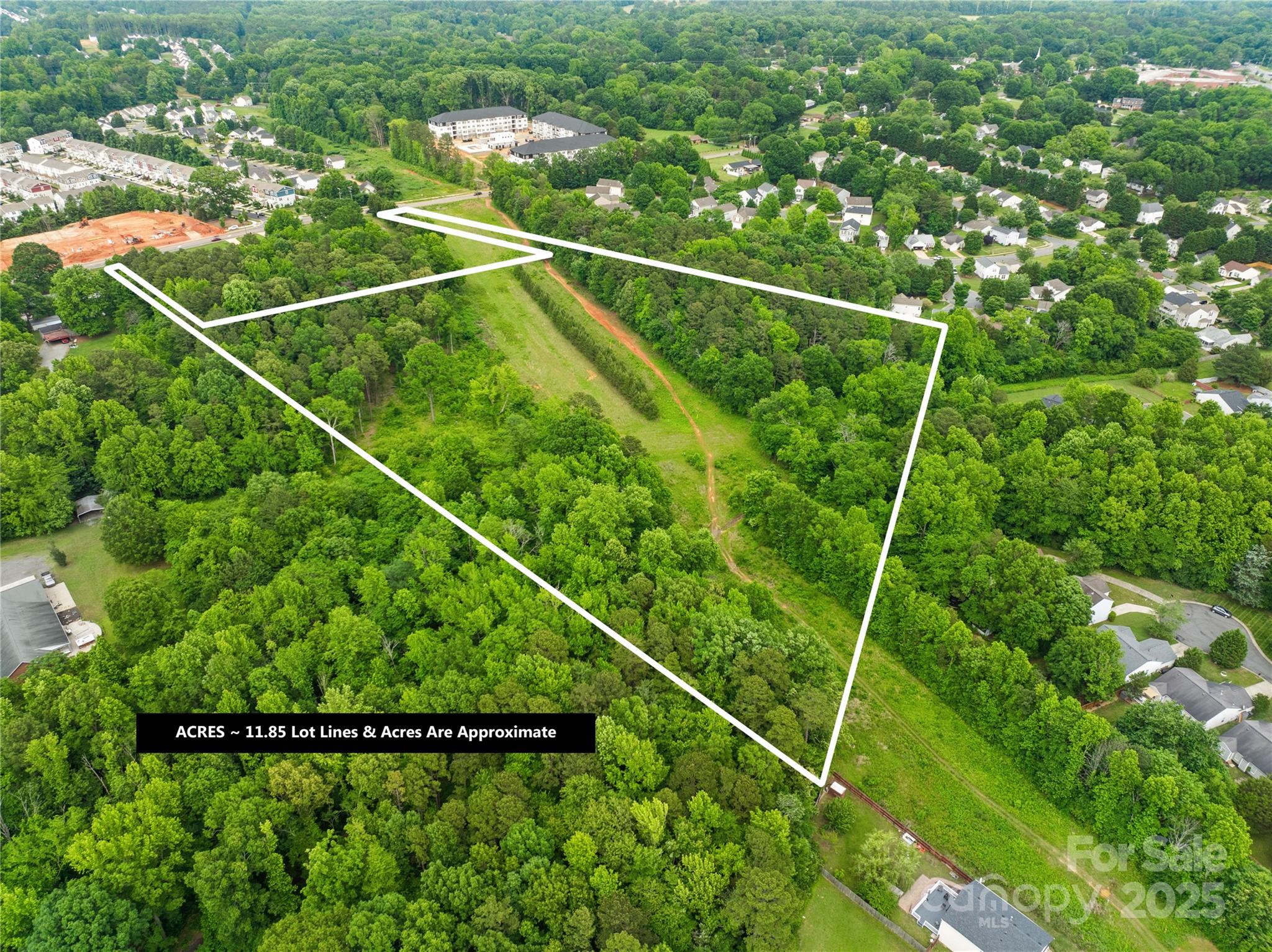 6411 Pleasant Grove Road Charlotte, NC 28216 - Photo 2 of 18 a view of a tennis court