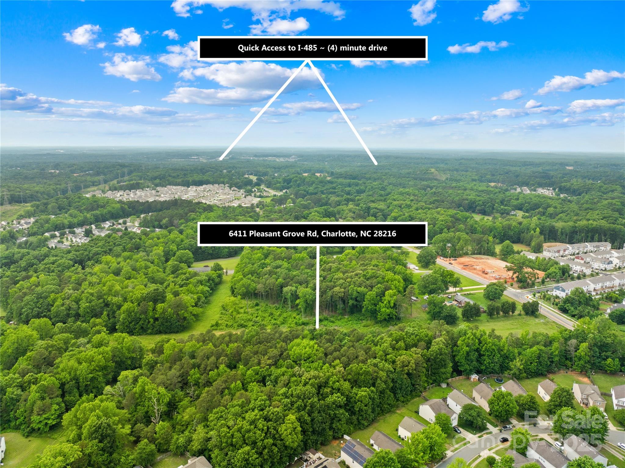 6411 Pleasant Grove Road Charlotte, NC 28216 - Photo 3 of 18 a view of a back yard