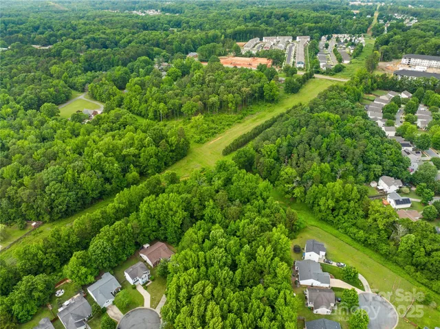 a view of a garden with a lake view