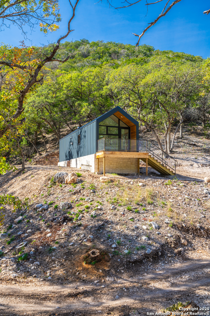 83 Leakey Tx 78873 Leakey, TX 78873 - Photo 14 of 38 a view of a house with a yard