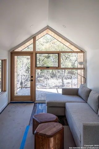 a view of a yard with lots of bushes