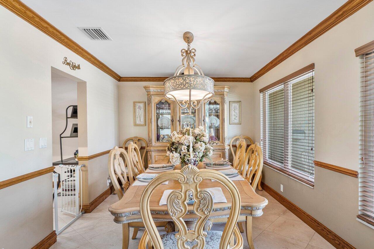 1018 Southwest 14th Street Boca Raton, FL 33486 - Photo 8 of 33 a view of a dining room with furniture window and outside view