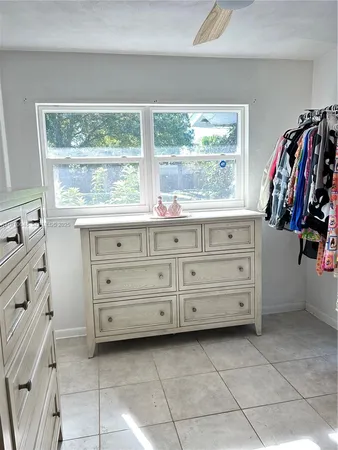 a view of a window and storage in a room