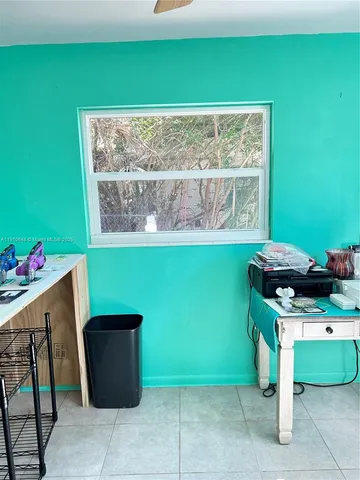 a room with cabinets and furniture