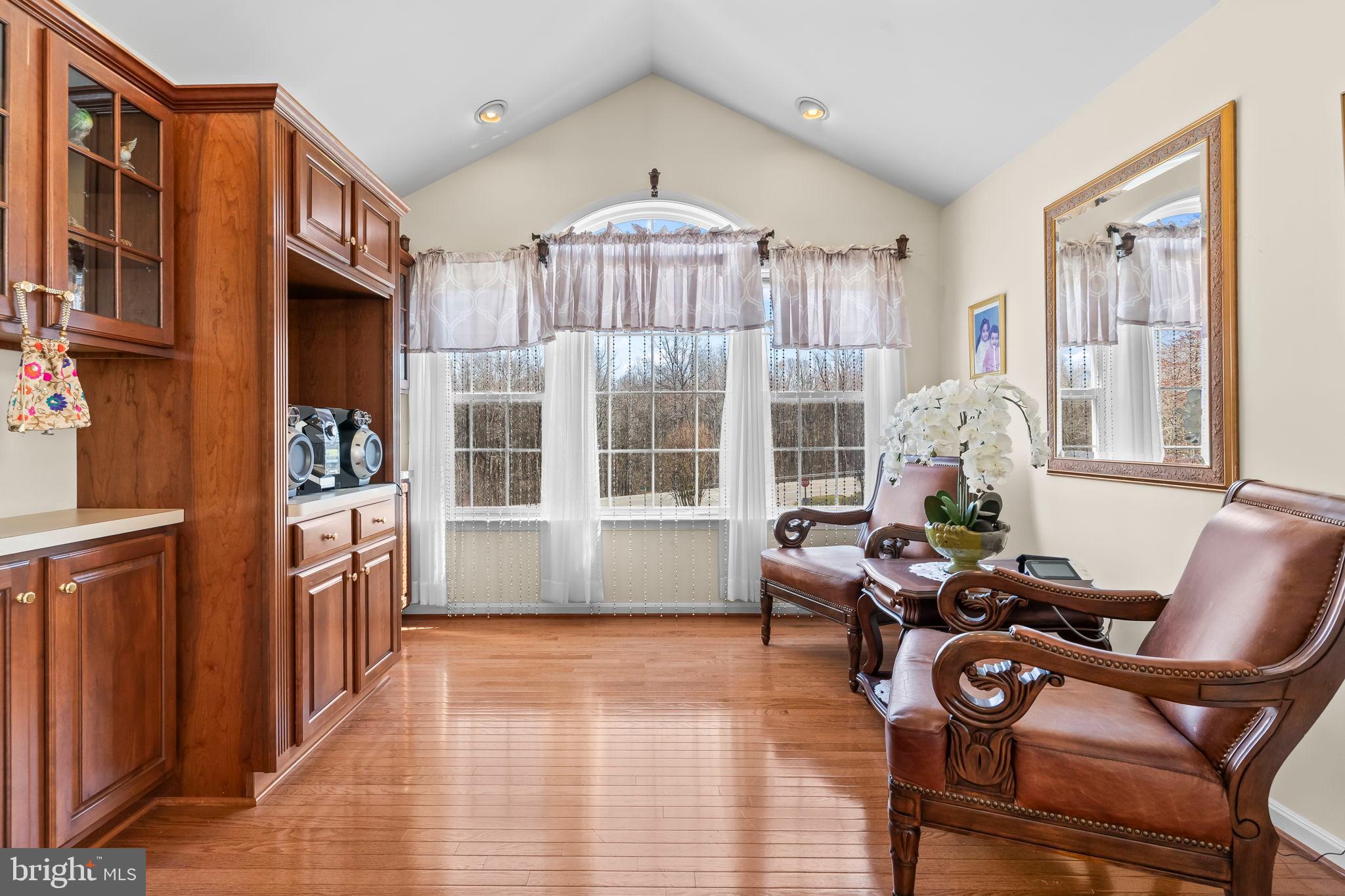 5 Cross Point Drive Owings, MD 20736 - Photo 21 of 63 a living room with furniture a fireplace and a large window