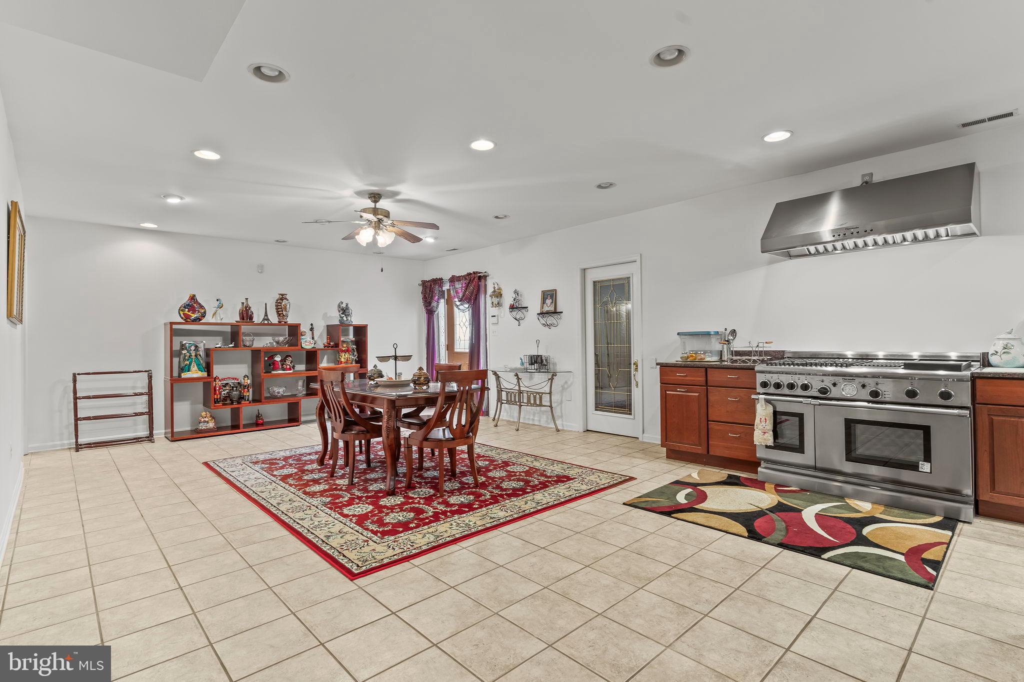 5 Cross Point Drive Owings, MD 20736 - Photo 36 of 63 a living room with furniture a flat screen tv and a dining table