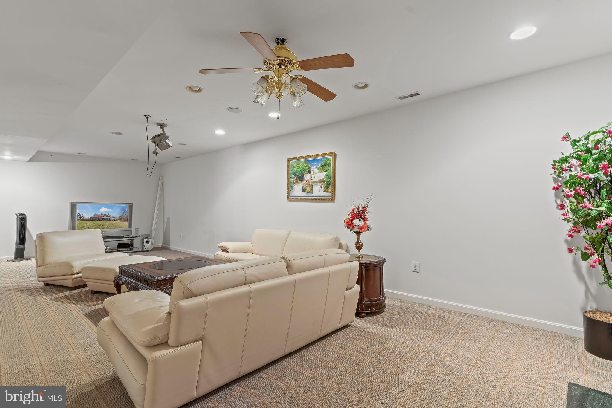 5 Cross Point Drive Owings, MD 20736 - Photo 41 of 63 a living room with furniture and flowers