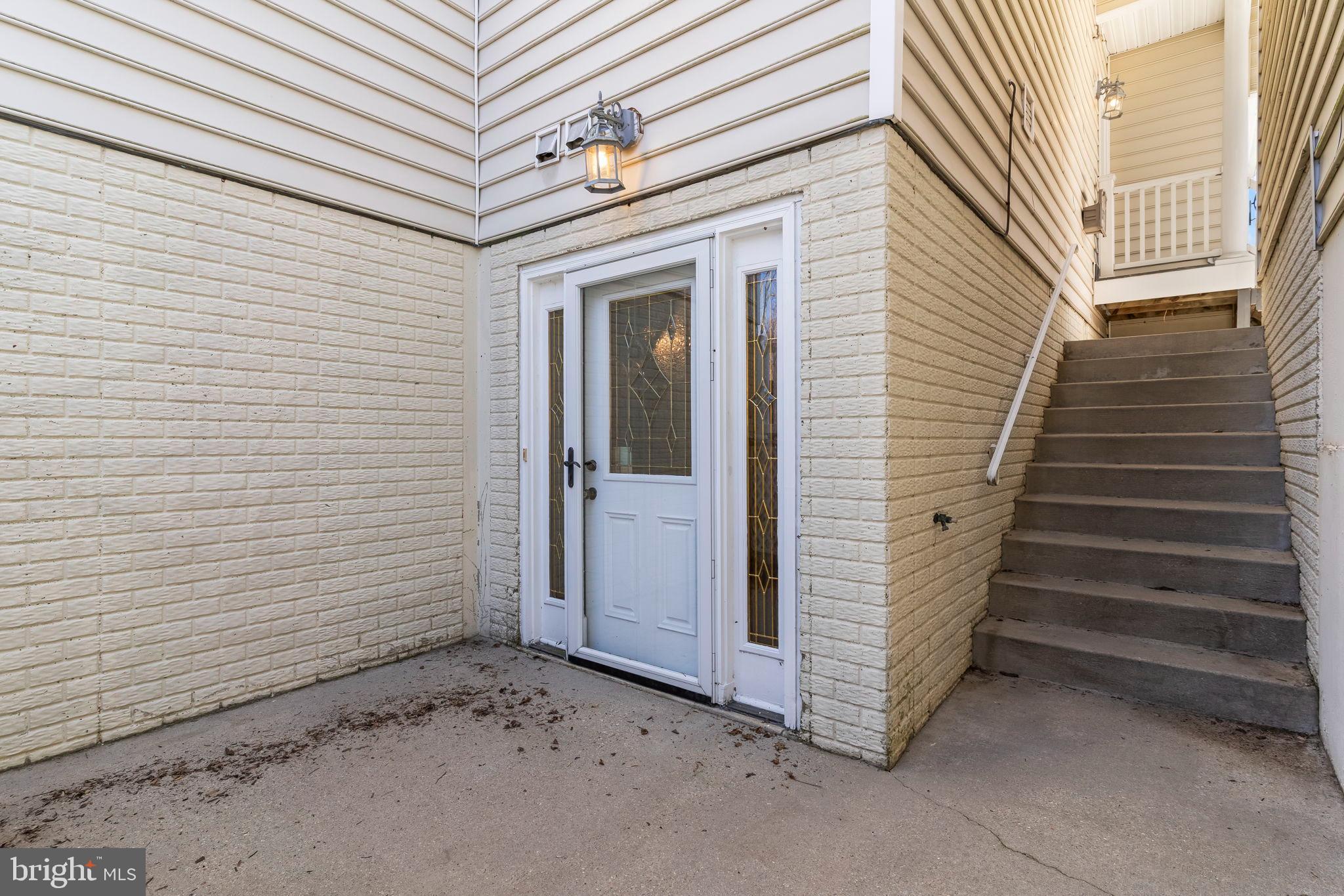5 Cross Point Drive Owings, MD 20736 - Photo 45 of 63 Rear entrance to lower level and apartment