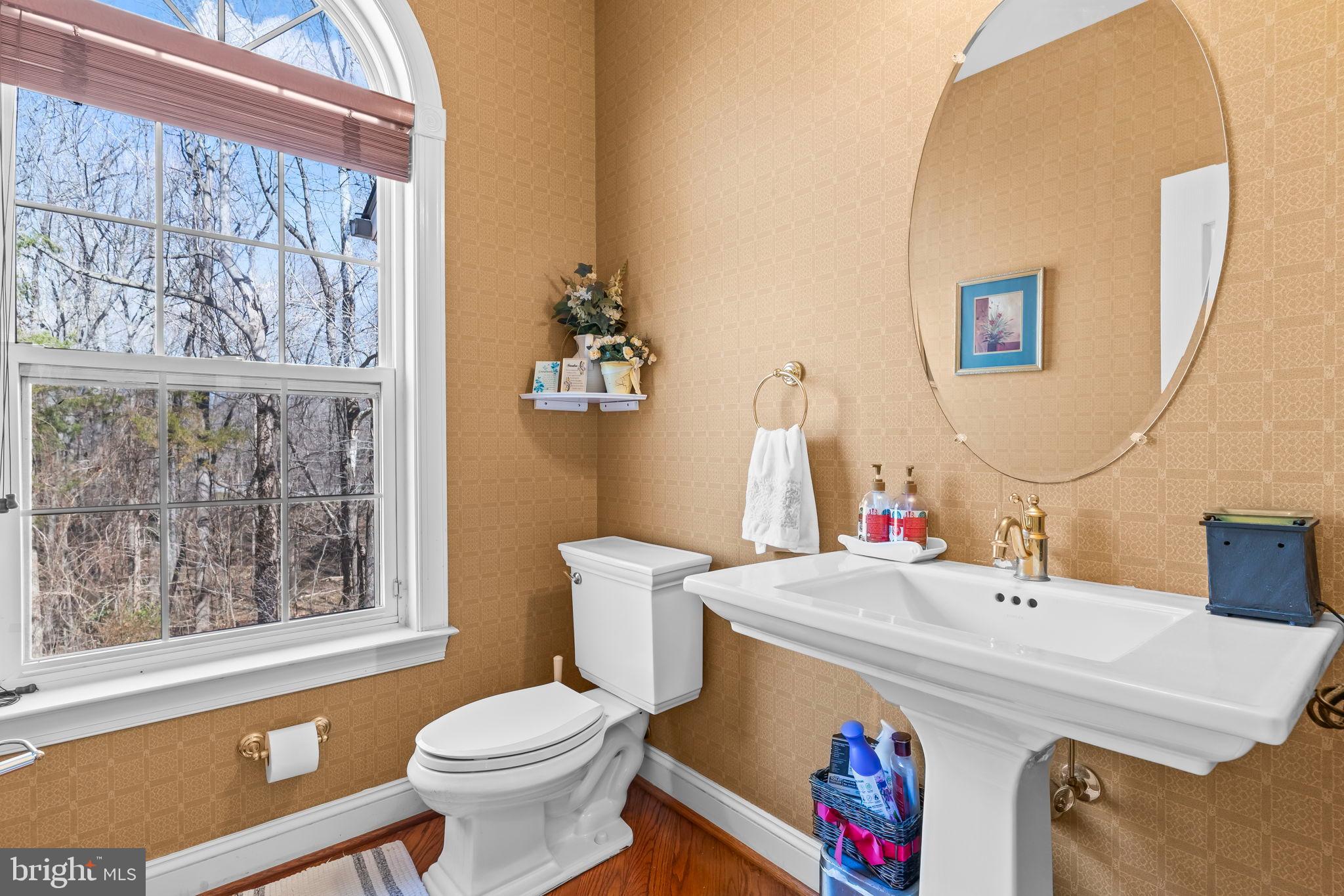 5 Cross Point Drive Owings, MD 20736 - Photo 46 of 63 a bathroom with a sink and a mirror