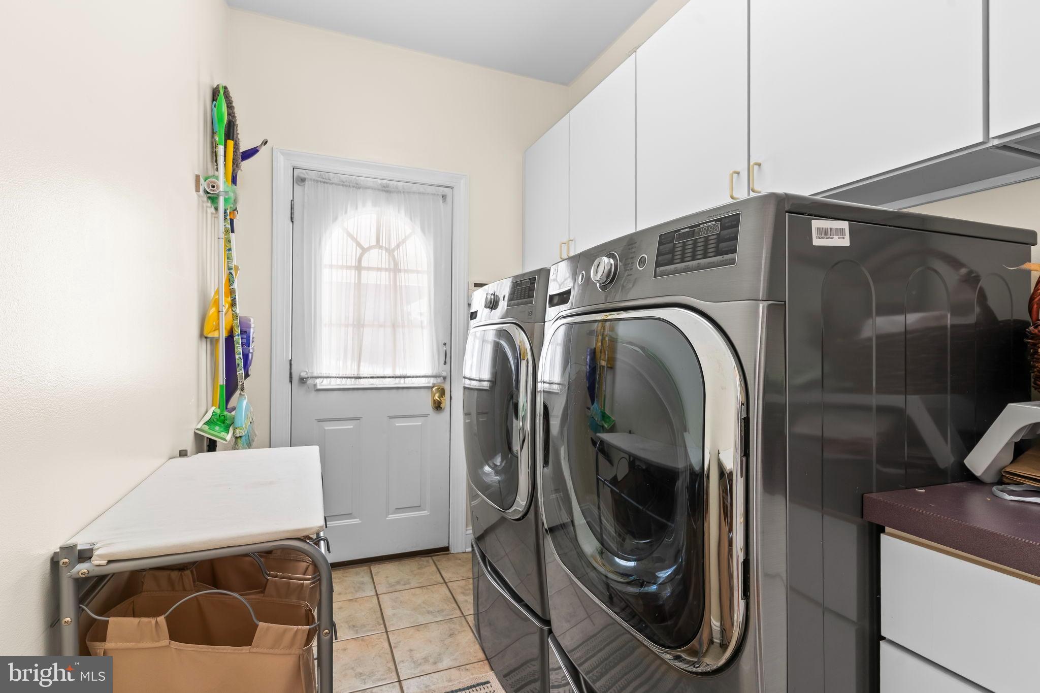 5 Cross Point Drive Owings, MD 20736 - Photo 47 of 63 a utility room with dryer and washer