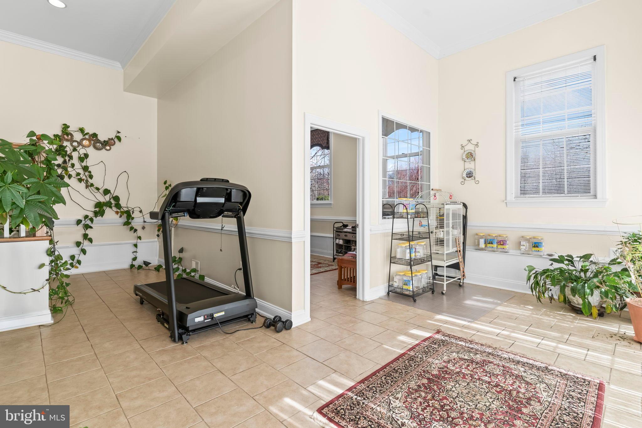 5 Cross Point Drive Owings, MD 20736 - Photo 48 of 63 a room with gym equipment and a table