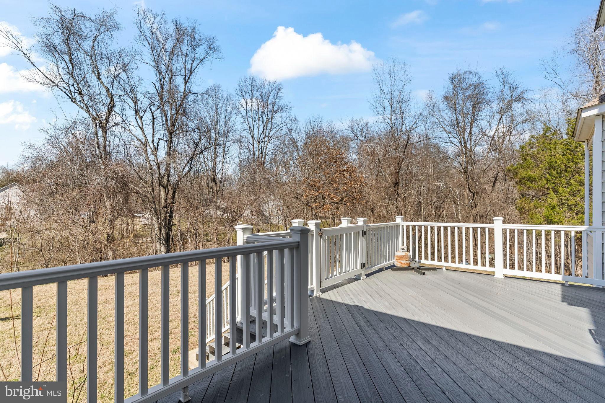 5 Cross Point Drive Owings, MD 20736 - Photo 51 of 63 Serene deck overlooking tranquil woods.