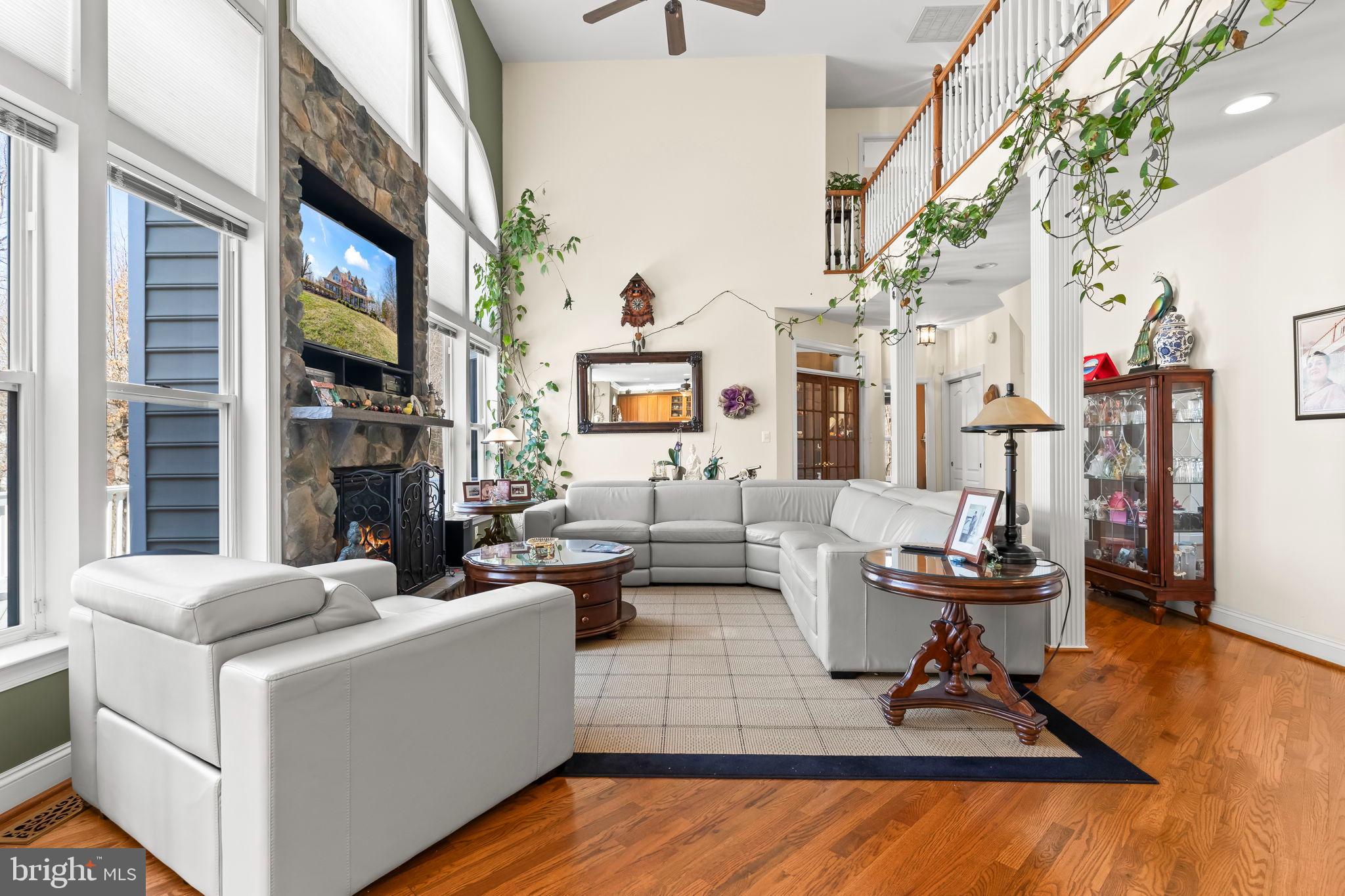 5 Cross Point Drive Owings, MD 20736 - Photo 6 of 63 a living room with fireplace furniture and a large window