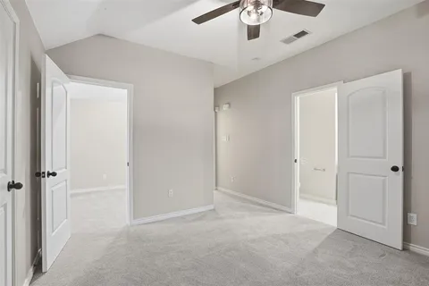 a bathroom with a granite countertop sink mirror and double