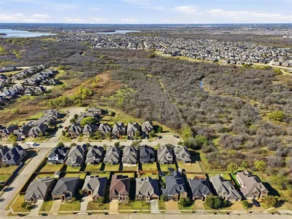 an aerial view of a house with swimming pool