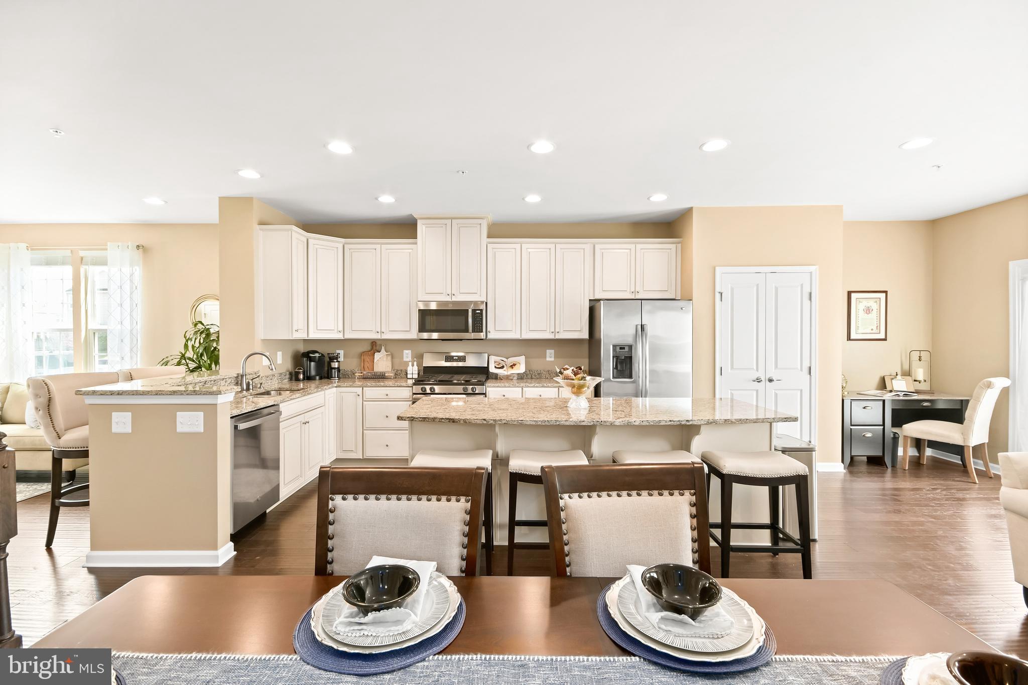 4502 Tinder Monrovia, MD 21770 - Photo 30 of 62 a kitchen with a white cabinets and appliances