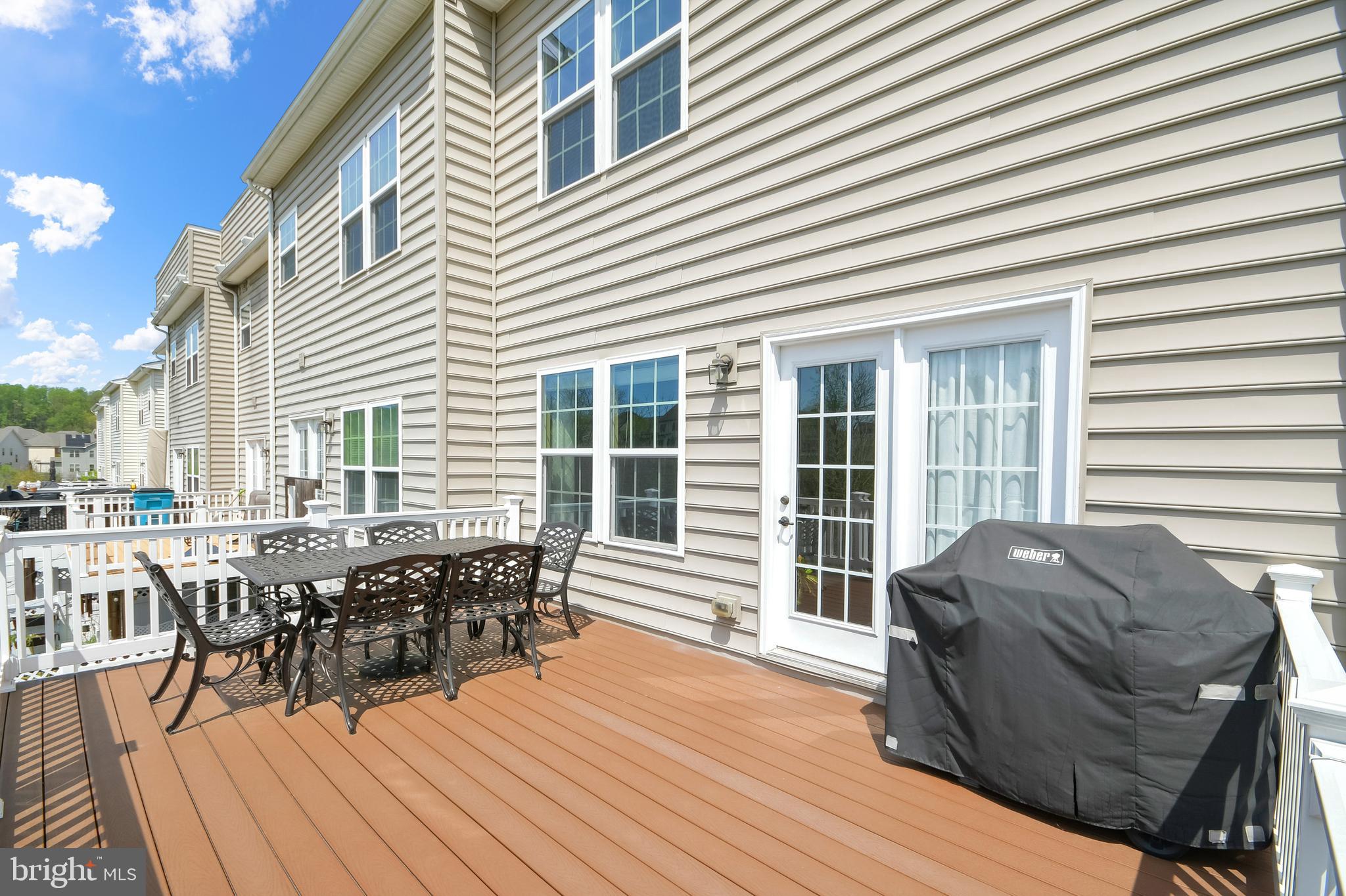 4502 Tinder Monrovia, MD 21770 - Photo 37 of 62 a balcony with furniture and wooden floor