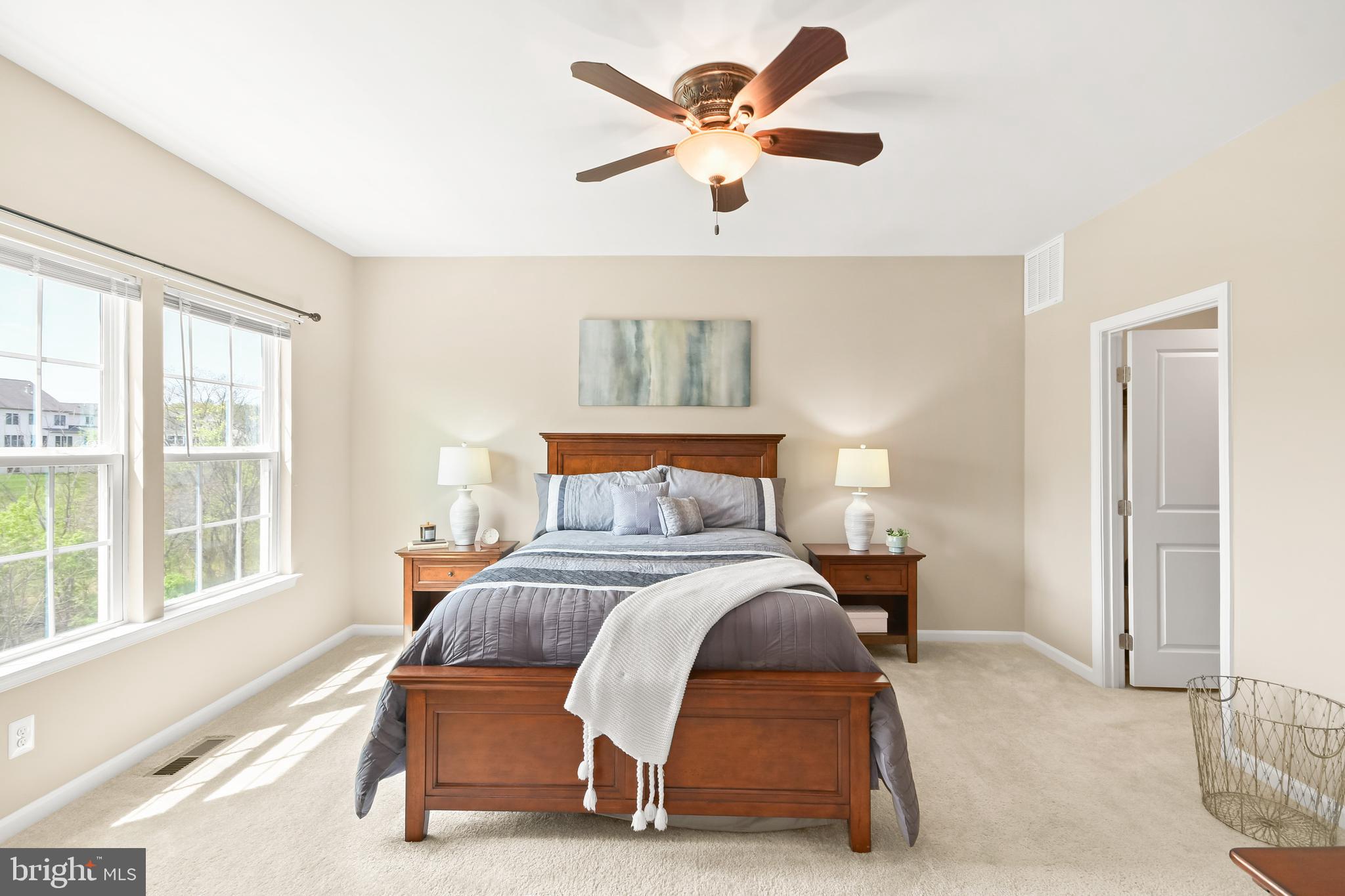4502 Tinder Monrovia, MD 21770 - Photo 40 of 62 a bedroom with a bed and a large window