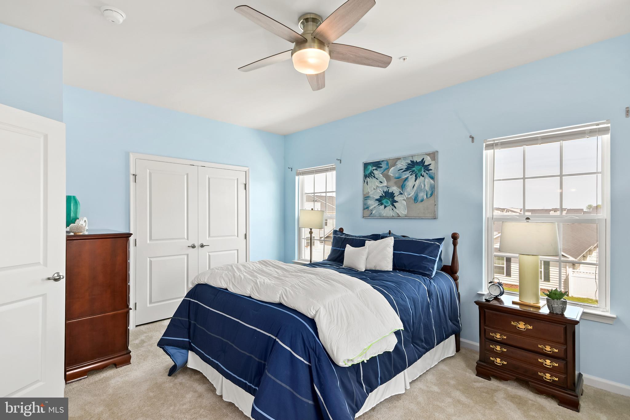 4502 Tinder Monrovia, MD 21770 - Photo 44 of 62 a bedroom with a bed and a chandelier