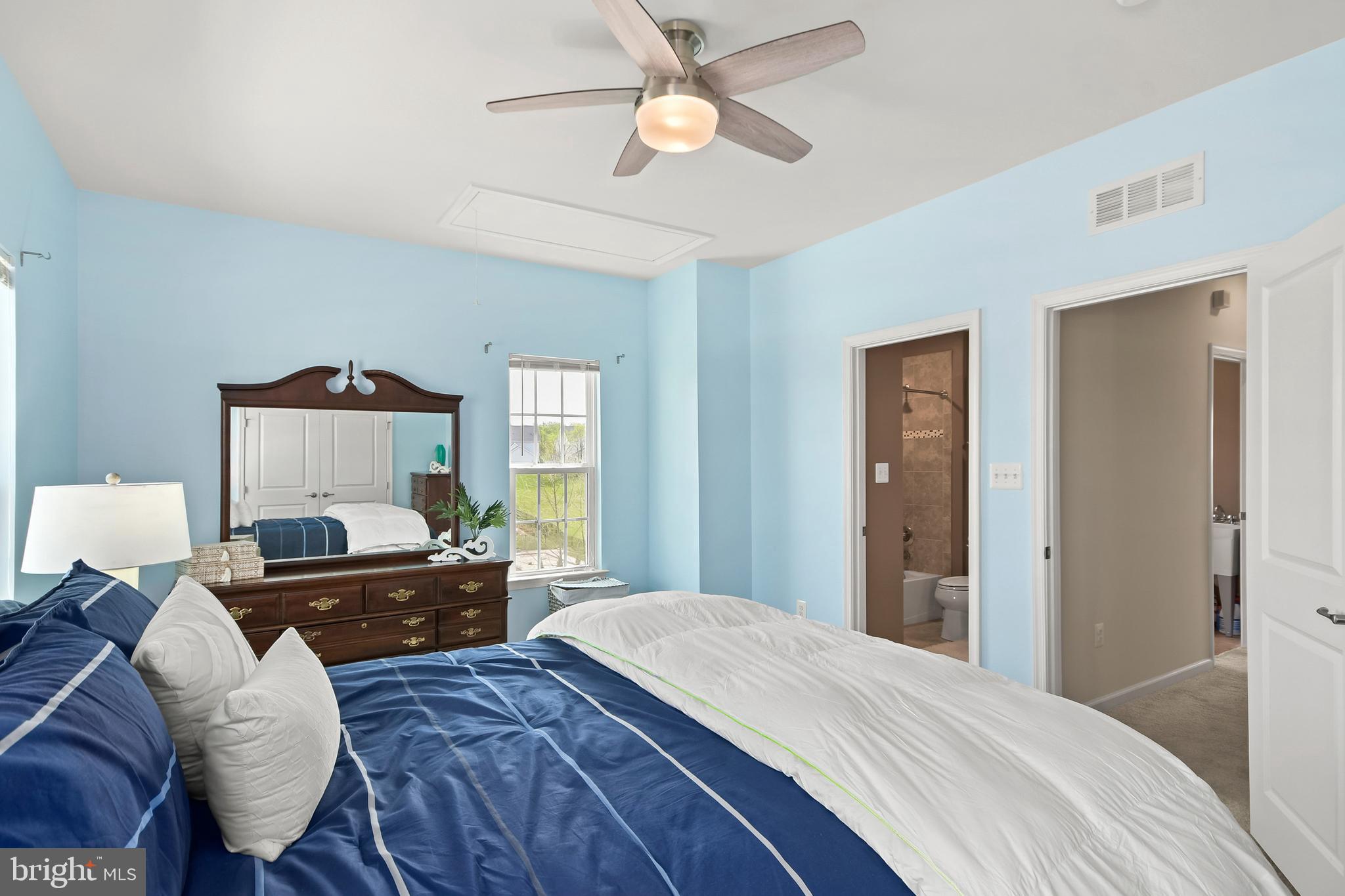 4502 Tinder Monrovia, MD 21770 - Photo 45 of 62 a bedroom with a bed and a chandelier