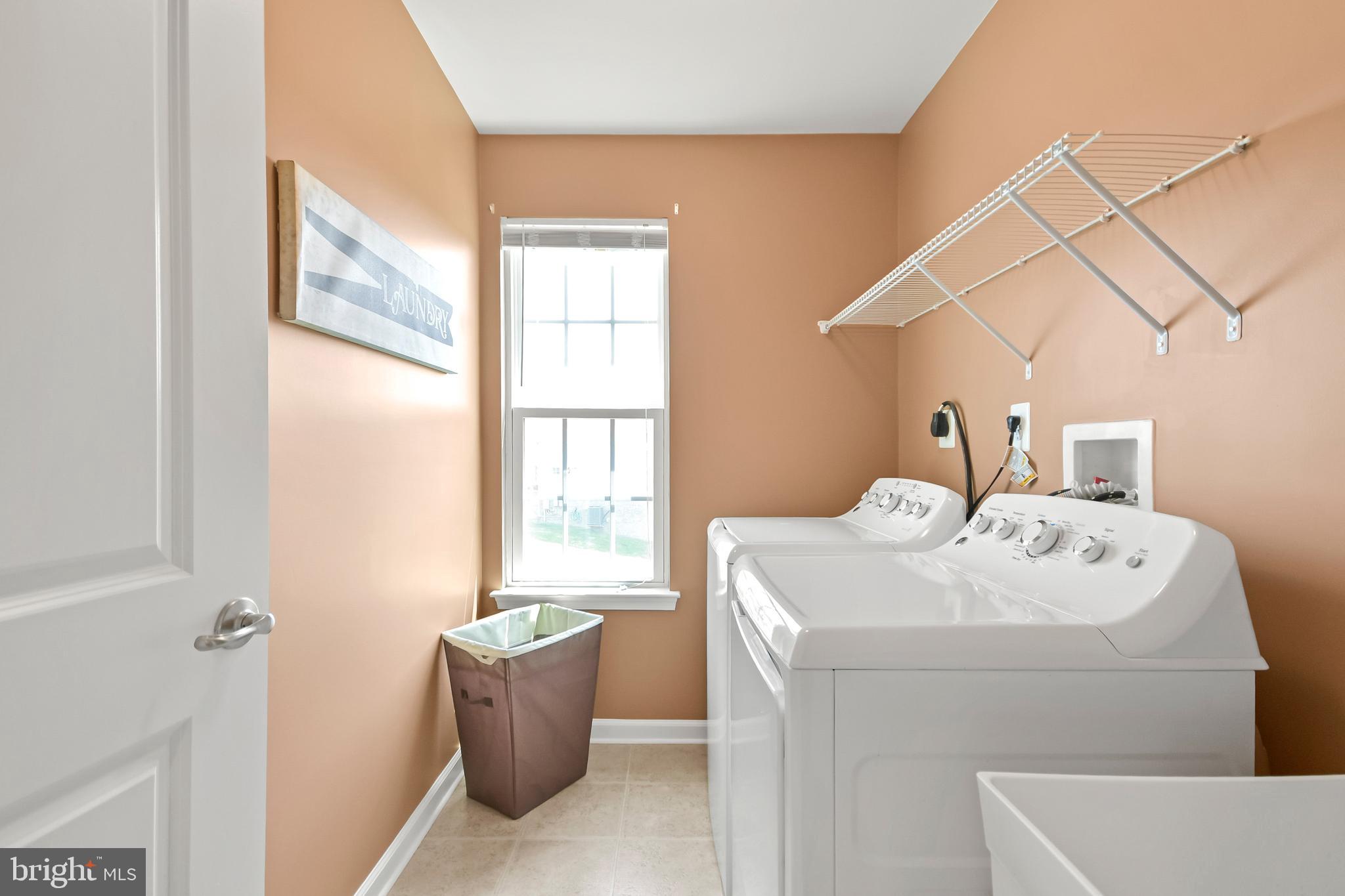4502 Tinder Monrovia, MD 21770 - Photo 47 of 62 a utility room with dryer and washer