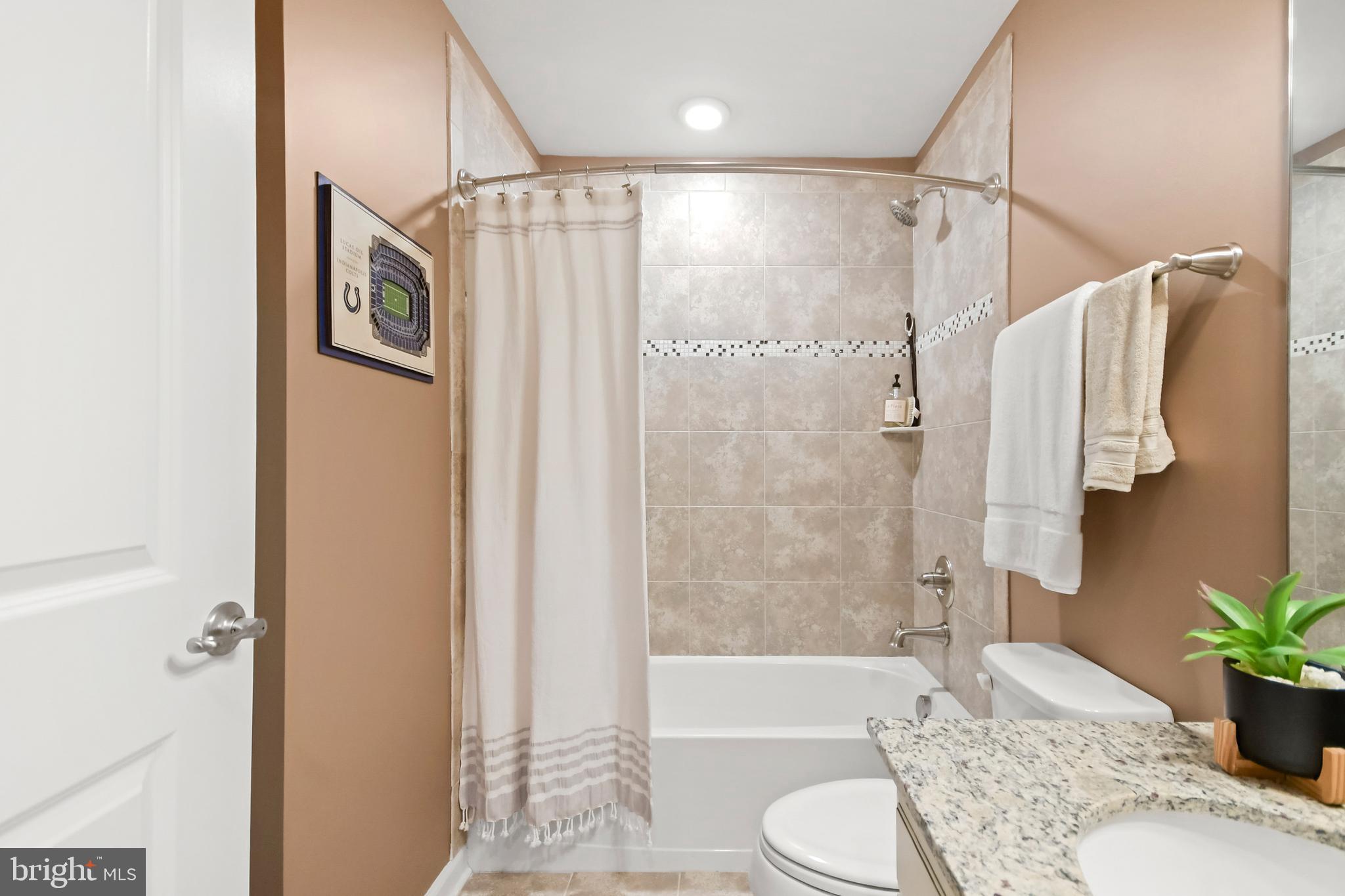 4502 Tinder Monrovia, MD 21770 - Photo 59 of 62 a bathroom with a sink toilet and shower