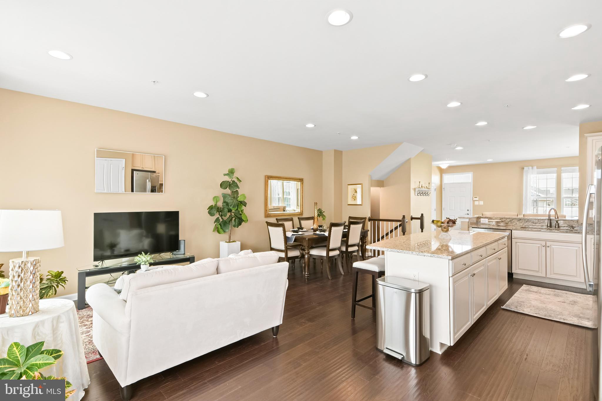 4502 Tinder Monrovia, MD 21770 - Photo 6 of 62 a living room with furniture flat screen tv and a fireplace