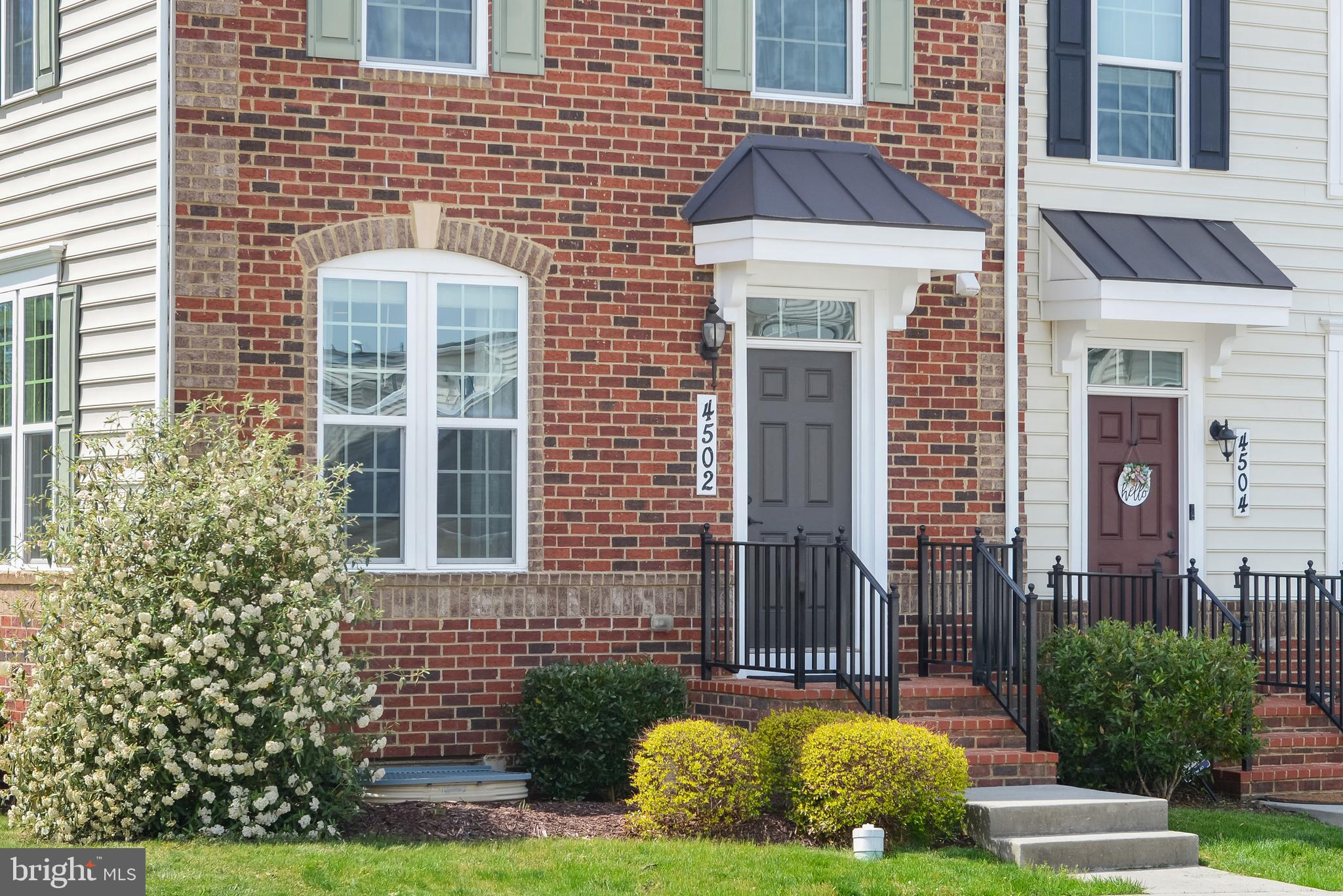 4502 Tinder Monrovia, MD 21770 - Photo 60 of 62 a view of a brick building next to a yard