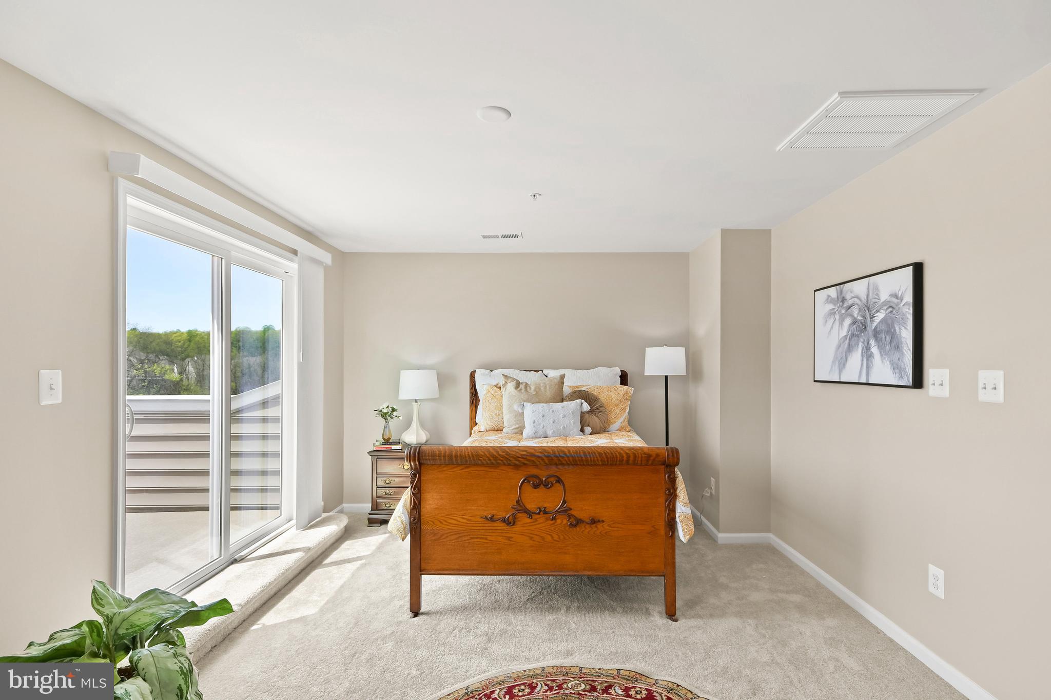 4502 Tinder Monrovia, MD 21770 - Photo 10 of 62 a bedroom with furniture and a potted plant
