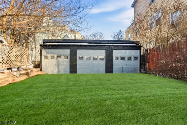 a view of a house with a back yard