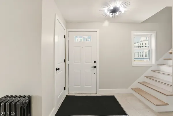 a view of a hallway with a bedroom