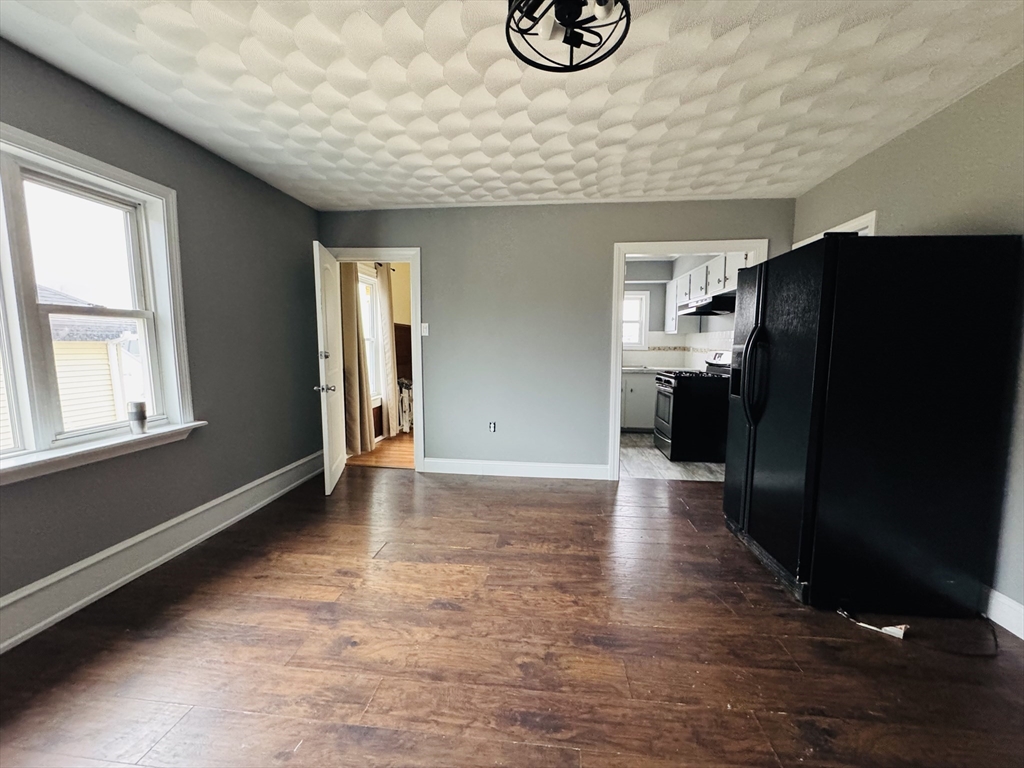 166 Bradford Avenue, Unit 3 Fall River, MA 02721 - Photo 15 of 19 an empty room with windows and closet