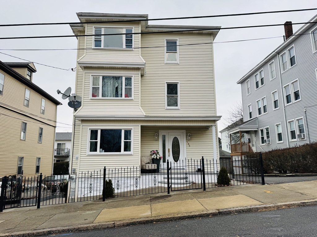 166 Bradford Avenue, Unit 3 Fall River, MA 02721 - Photo 2 of 19 a view of a building with a street
