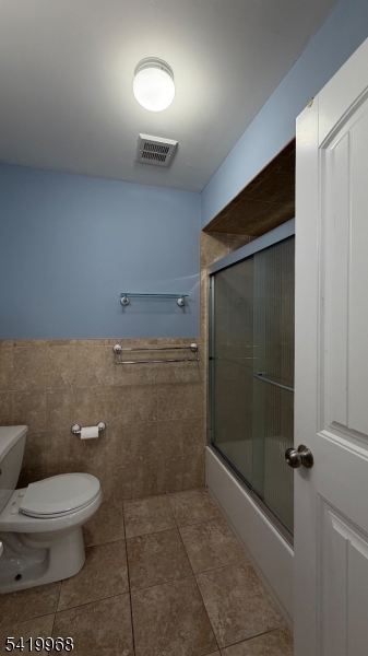 159 Lafayette Street, Unit 3 Newark, NJ 07105 - Photo 10 of 17 a bathroom with a toilet and a shower