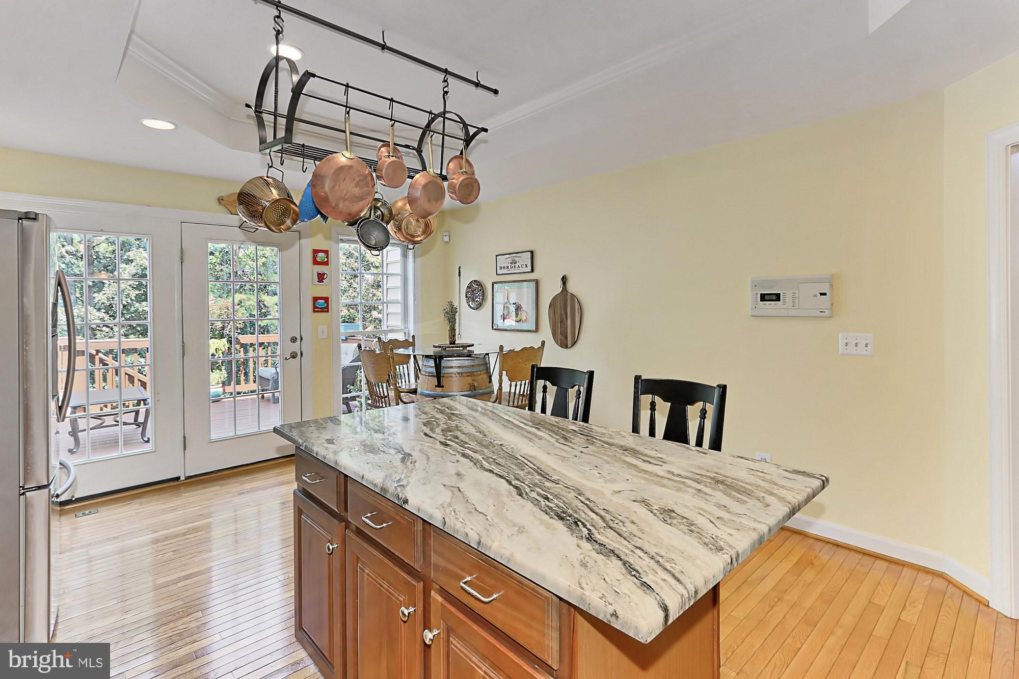 7357 Cluster House Way Gainesville, VA 20155 - Photo 14 of 46 French doors to custom walk-down deck