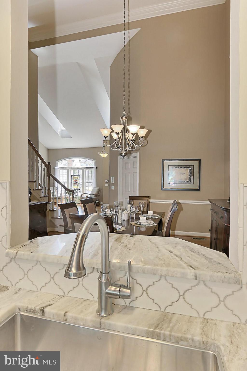 7357 Cluster House Way Gainesville, VA 20155 - Photo 15 of 46 Floating Kitchen Island with Fantasy Brown Marble