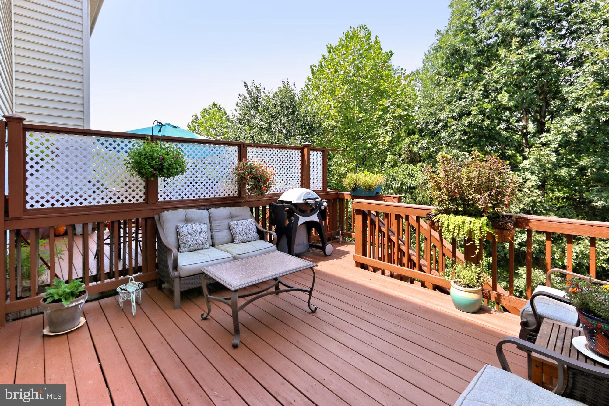 7357 Cluster House Way Gainesville, VA 20155 - Photo 40 of 46 Walk-down spacious deck for outdoor enjoyment.