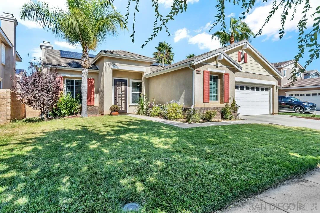 4460 Cloudywing Road Hemet, CA 92545 - Photo 2 of 41 a front view of house with yard and green space