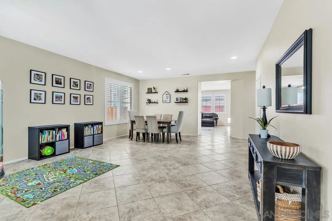 4460 Cloudywing Road Hemet, CA 92545 - Photo 3 of 41 a living room with furniture and a table