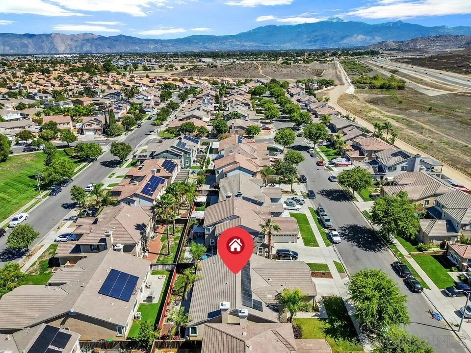 4460 Cloudywing Road Hemet, CA 92545 - Photo 40 of 41 an aerial view of residential houses with outdoor space and parking