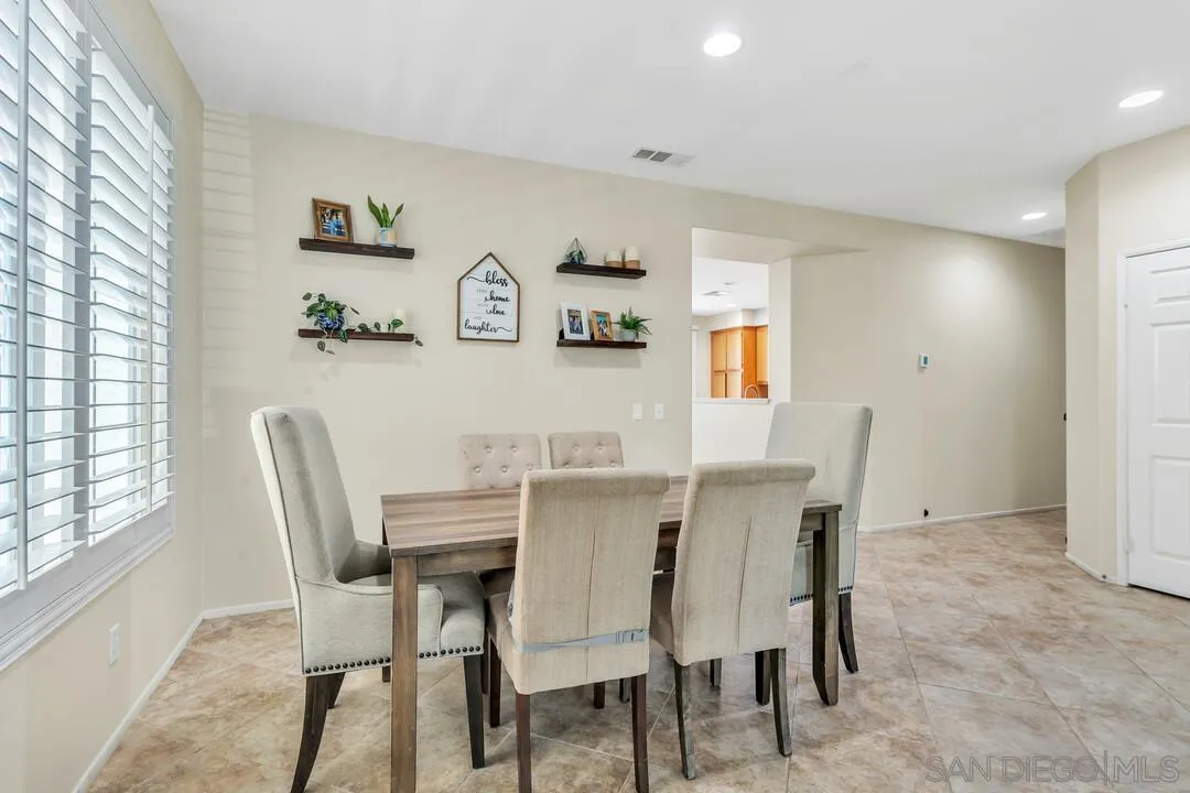 4460 Cloudywing Road Hemet, CA 92545 - Photo 6 of 41 a dining room with furniture and window