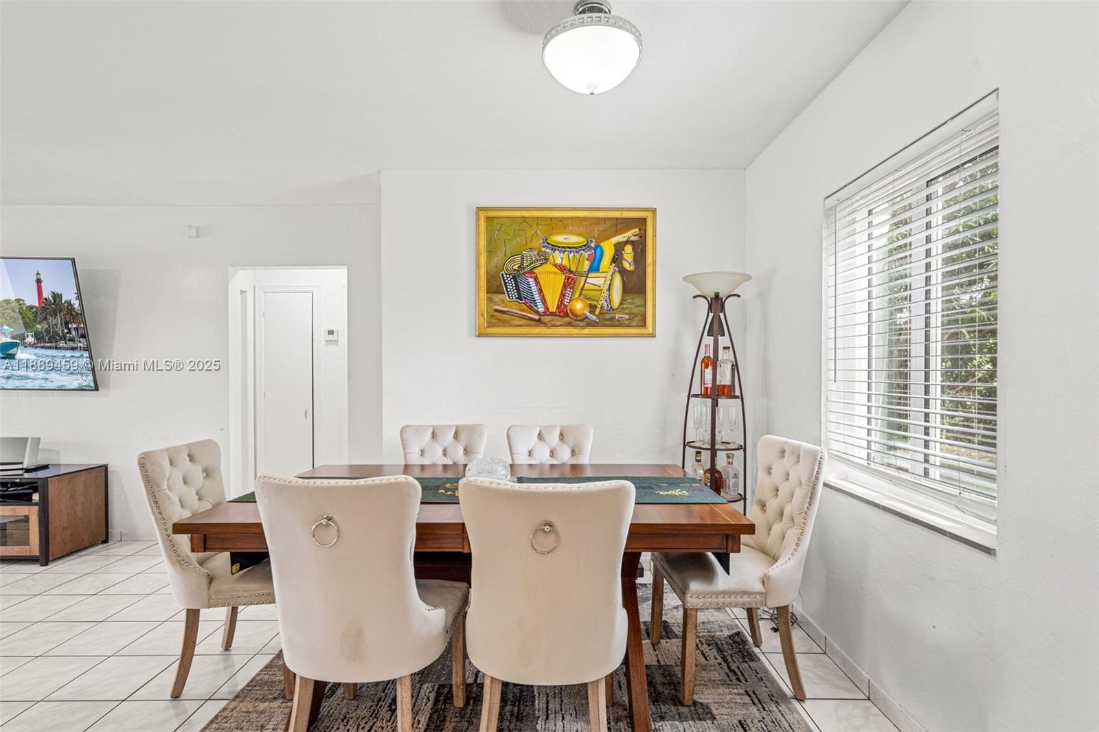 5340 Southwest 5th Street Miami, FL 33134 - Photo 13 of 43 a view of a dining room with furniture window and outside view