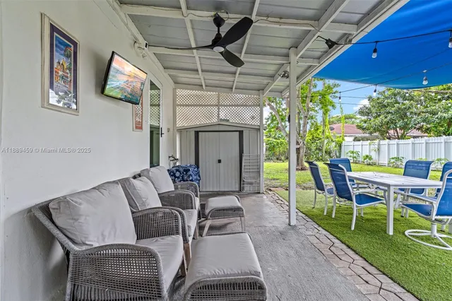 a outdoor living space with furniture and garden view