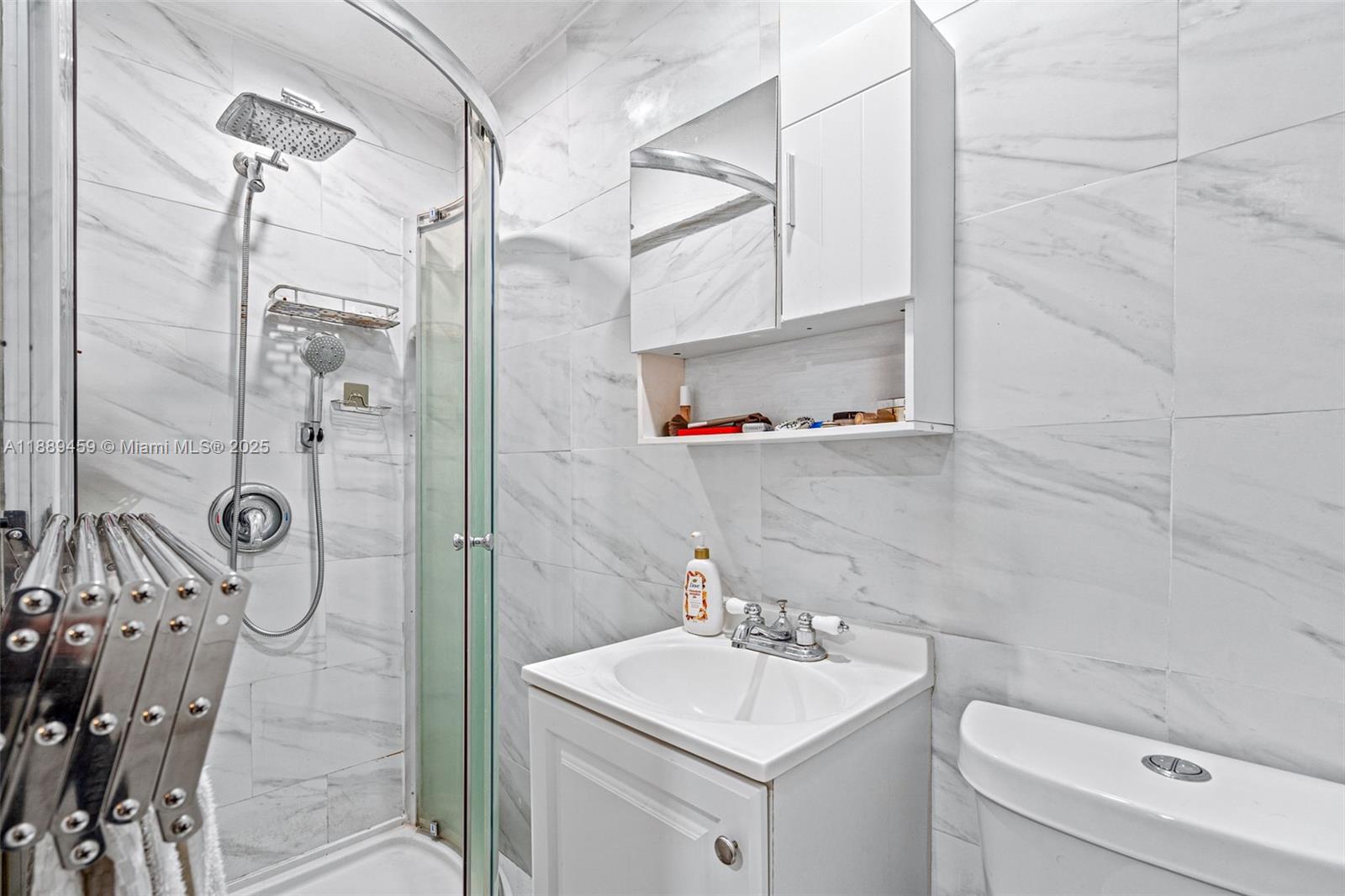 5340 Southwest 5th Street Miami, FL 33134 - Photo 27 of 43 a bathroom with a sink toilet and shower