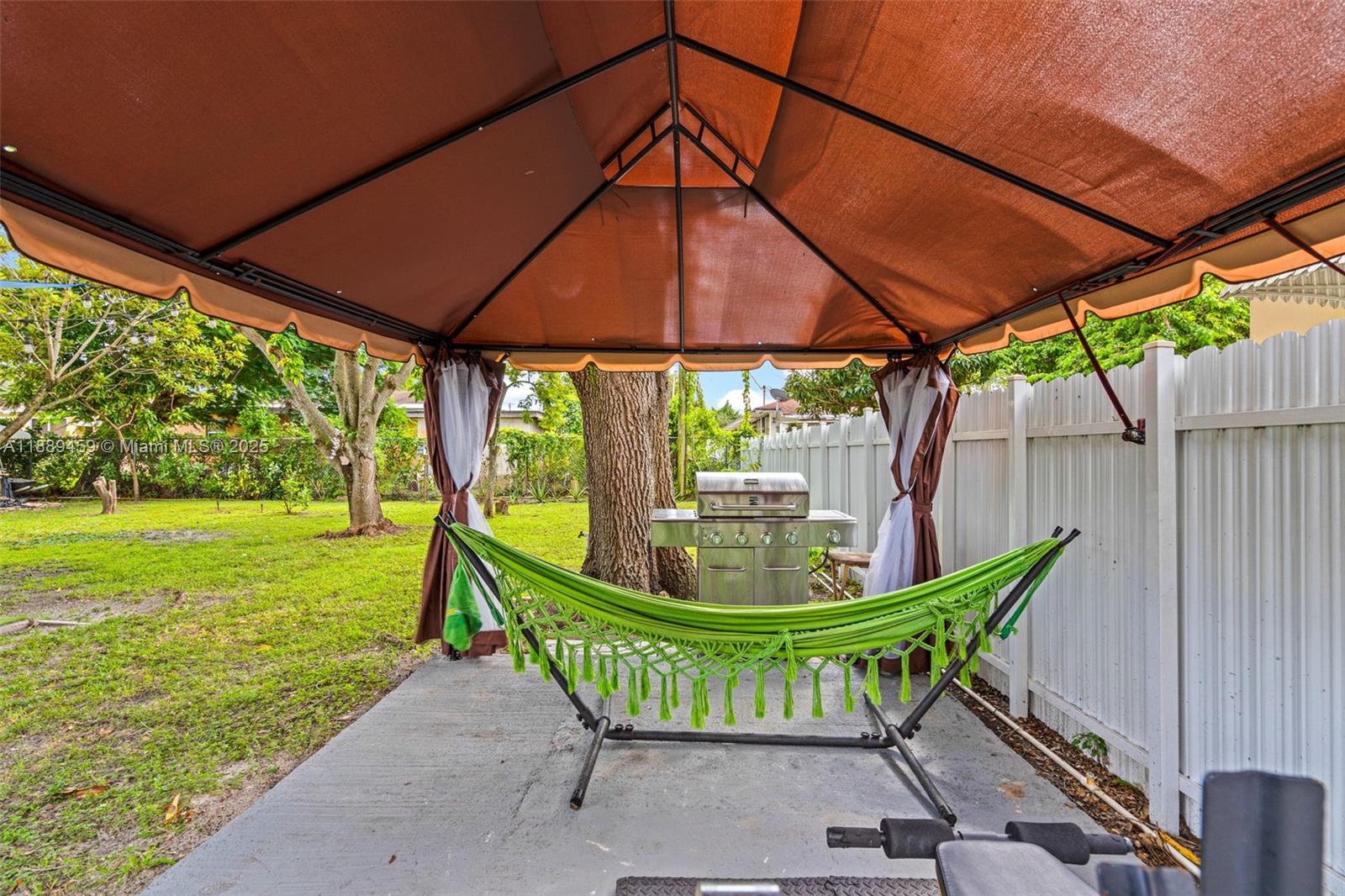 5340 Southwest 5th Street Miami, FL 33134 - Photo 30 of 43 a view of an outdoor sitting area with a backyard